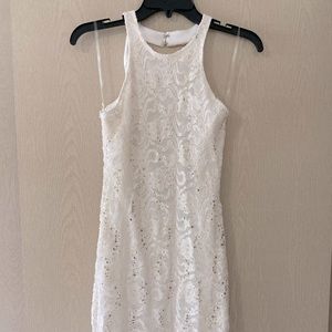 White lace mini dress with gold sparkles